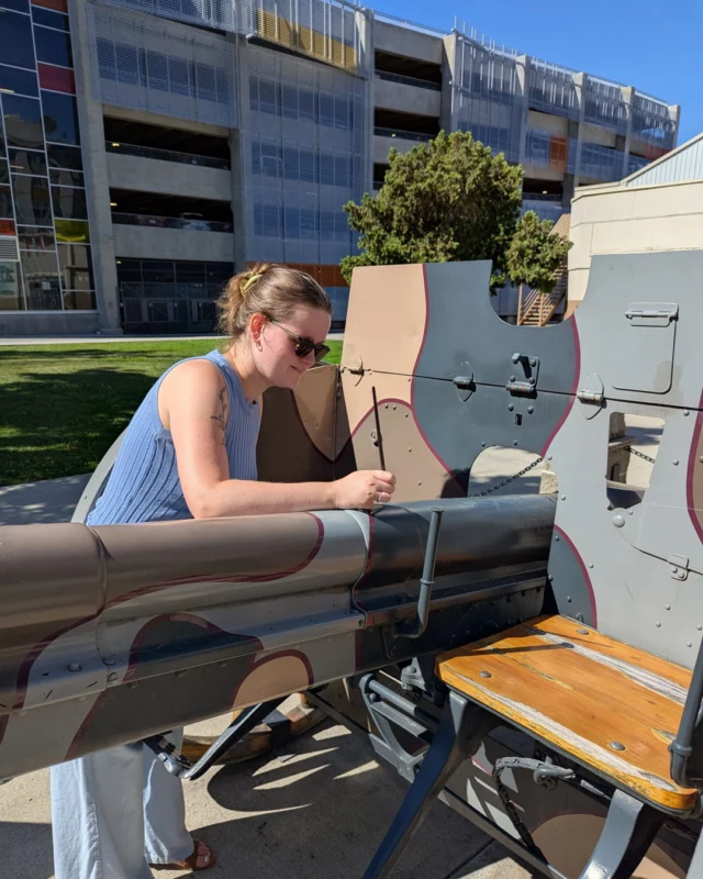 Our Conservation Associate, Megan, is taking advantage of a beautiful Okanagan day! She's touching up some of the paint on the WWI trophy field gun outside the Okanagan Military Museum. Come by and see its refreshed look, and learn about its fascinating history. 
.
.
.#ThisIsConservation #MuseumWork #LearningIsFun #KelownaMuseums #DowntownKelowna #ExploreKelowna