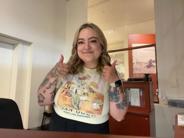 Meet Kendra, our Museum Administration Assistant!

We’re lucky to have Kendra with us at the Okanagan Heritage Museum this summer. Kendra helps ensure visitors have an exceptional experience. She also keeps busy responding to inquiries and managing visitor statistics.

"The most rewarding aspect of working at Kelowna Museums is the incredible team—supportive, passionate, and genuinely welcoming. The environment here is both inclusive and engaging, and I’ve never felt more at home in a workplace. A close second is hearing visitors share their personal connections or memorable experiences with our exhibits. It’s truly fulfilling to help foster those meaningful moments through history and education."

One of Kendra’s favourite things is when visitors tell her how much they like our exhibition on homelessness. “It really just makes my day because that’s my favourite exhibit. I think it’s so important to share the stories of people using
 their own voice, and I'm so glad that Kelowna Museums recognizes the importance of showing this part of our community as humans with real struggles.”

Come say hello and experience the Okanagan Heritage Museum for yourself. Check
www.kelownamuseums.ca/plan-your-visit/ for details.
.
.
.
#MuseumMonday #MeetTheTeam #MuseumWorkers #MuseumWork #MuseumLife #KelownaMuseums #DowntownKelowna #ExploreKelowna